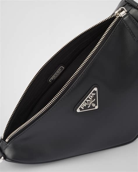 bolso triangulo prada|Minibolso Prada Triangle De Piel.